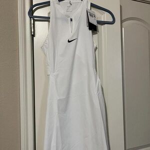 Nike women’s white tennis dress size XS
New with tags